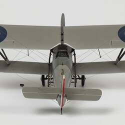 Model of silver aeroplane. Rear view.