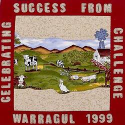 Square fabric patch depicting a farm scene