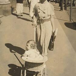 Digital Photograph - Woman Pushing Baby in Pram & Carrying Shopping, Collingwood, 1930-1933