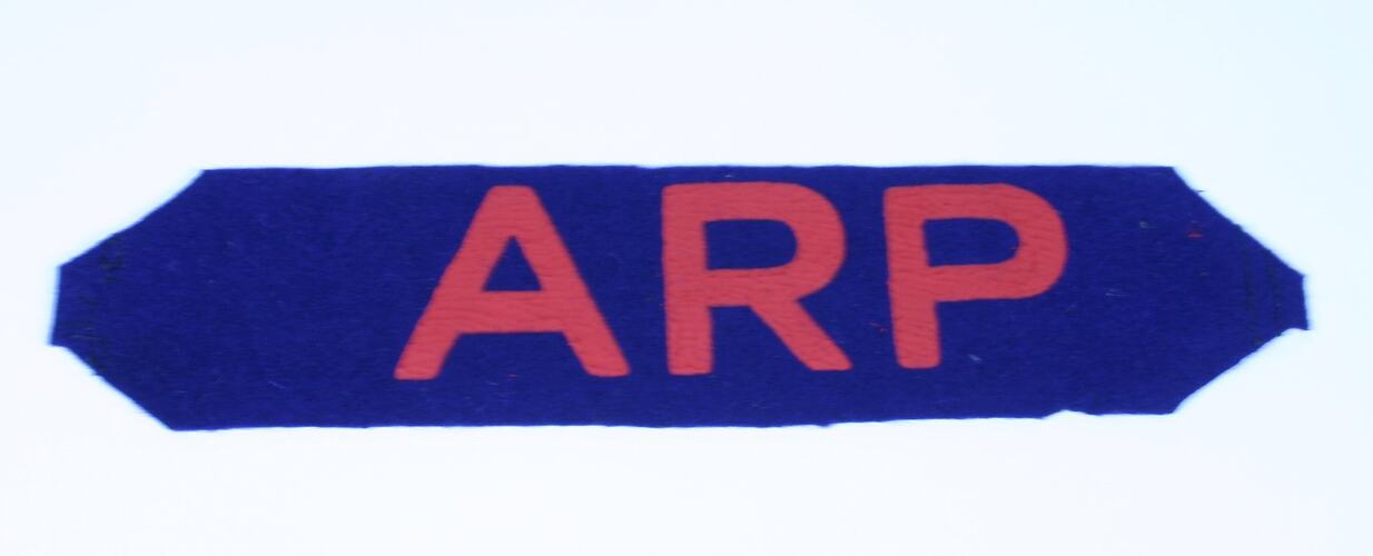 Blue and red ARP amrband.
