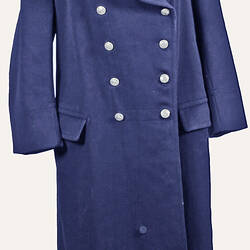 Navy full length coat, double breasted with metal buttons, Detail on epaulettes. Two hip pockets.