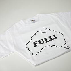 Folded white t-shirt, "Full!" written inside Australian map.