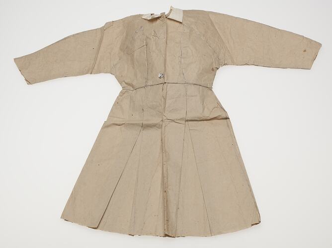 Doll's Dress - Brown Paper, circa 1954