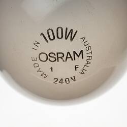 Top view of milky coloured 100 watt light globe.