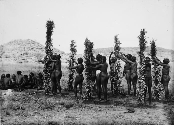 Arrernte women holding sacred Arachitta poles, Alice Springs, Central Australia, 1895