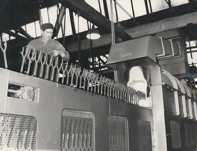 A man operating a machine.