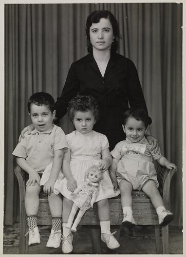 Portrait of a mother with her three children