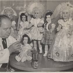 Photograph - L. J. Sterne Doll Co., Leo Sterne Painting Lips on Doll, Melbourne, Oct 1953