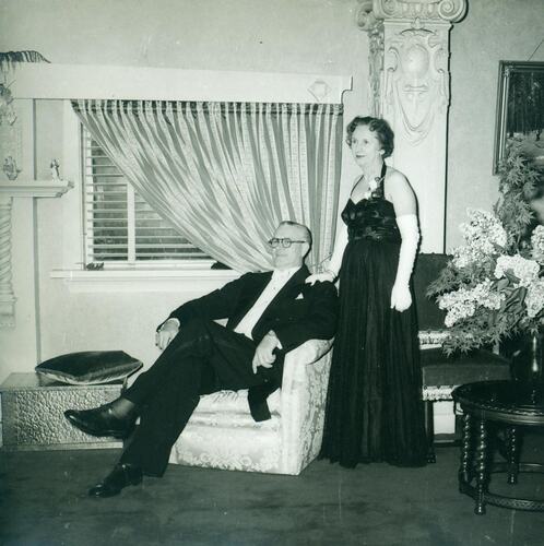Man and woman in evening dress.