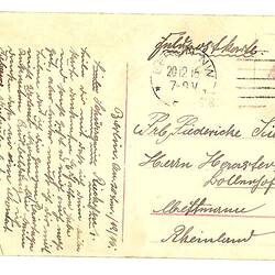 Back of postcard showing hand-writing and date stamp.