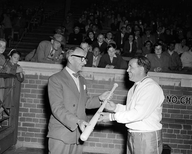 Man Presenting Bat to Baseball Player, Melbourne, Victoria, 1956
