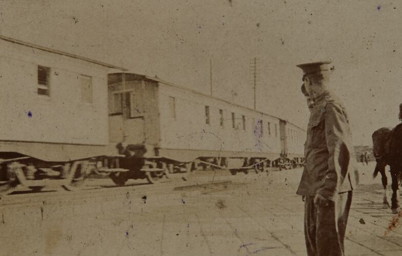 Two Soldiers in Front of Ambulance Train