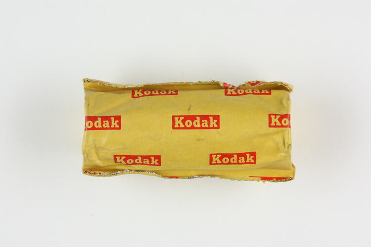Foil packet with Kodak logo stamped on it.