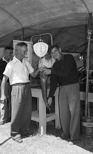 Monochrome photograph of a fishing competition.