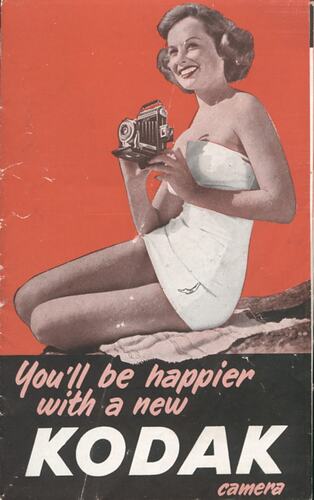 Cover page with photograph of woman holding camera.