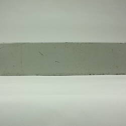 Rectangular metal box. Side view.