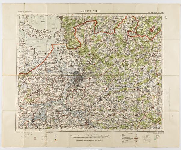 Map, paper backed with cloth, printed in black, green, blue and red on white. Treed areas in green.