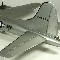 Silver model aeroplane. Detail back tail.