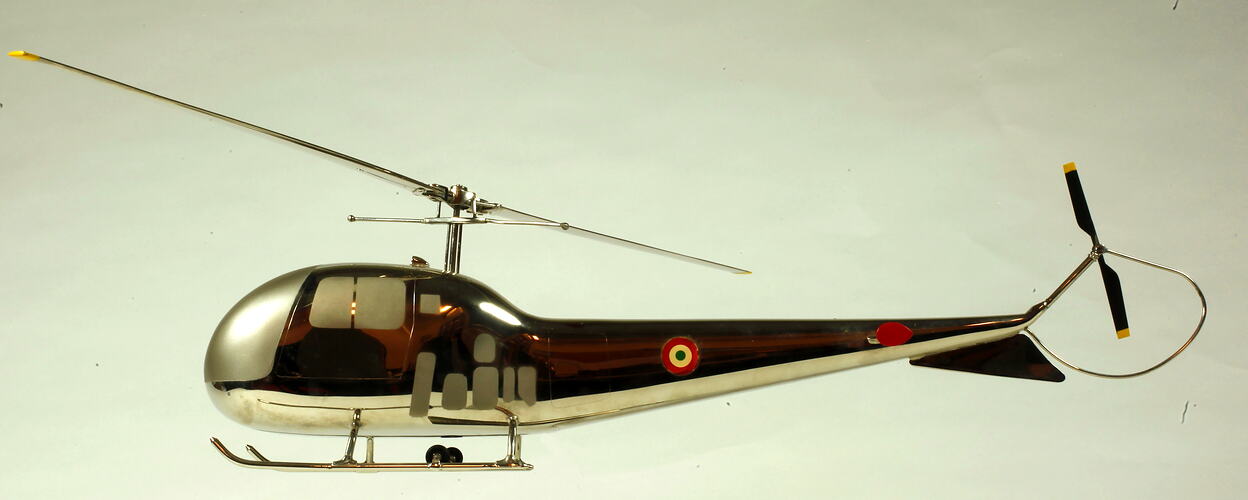 Chrome plated helicopter model. Left profile.