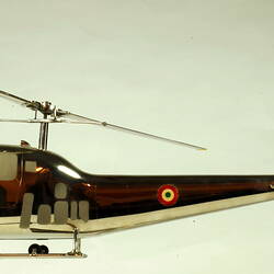 Chrome plated helicopter model. Left profile.