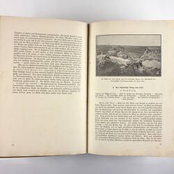 Inside pages of book showing photo of ancient Troy (?).