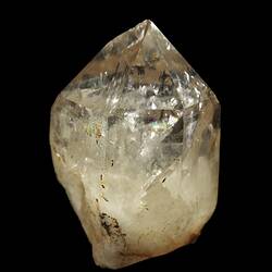 Pointed crystal, clear at top, cloudy at base.