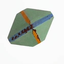 Wooden crystal model painted green, blue and orange.