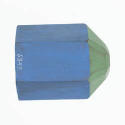 Wooden crystal model painted blue and green.