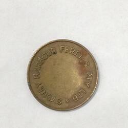 Round ferry transport token.