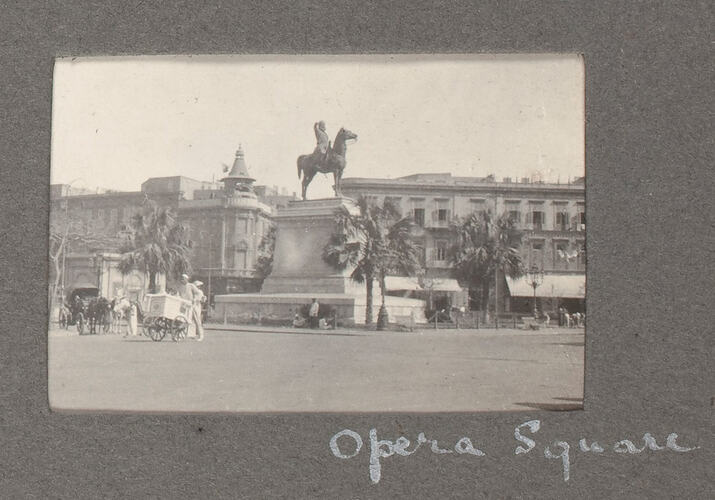 City square with statue of horse.