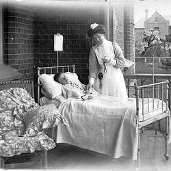 Negative - Nurse Helen (Nellie) Beckett with Boy Patient, Alfred Hospital, South Yarra, Victoria, 1904