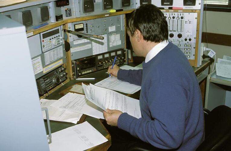 Michael Greenwood at console. Melbourne Coastal Radio Station, Cape Schanck, Victoria