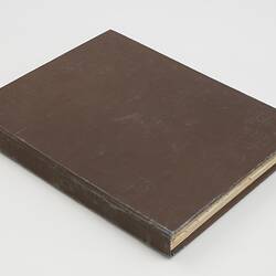 Brown cloth bound book.