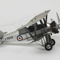 Model of silver aeroplane. Profile.