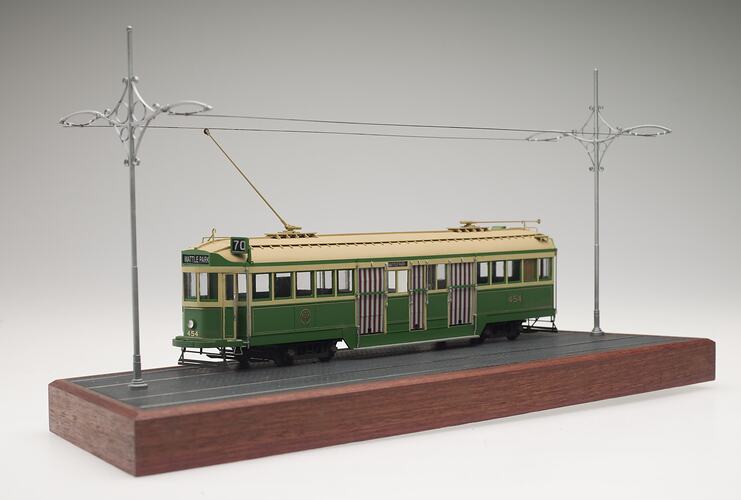 Melbourne electric tram model (No. 70) complete with wires and track.