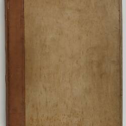 Light brown book cover with dark brown binding down the right-hand side.
