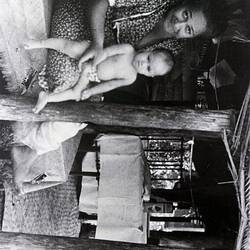 Negative - Woman with Two Children in Pavilion, Pacific Islands, circa 1930s