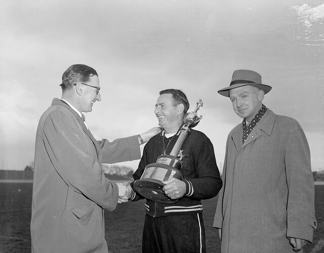 Negative - Coca-Cola, Baseball Player Receiving Trophy, South Melbourne, Victoria, Jul 1954