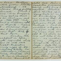 Open book, 2 cream pages with faint grid pattern. Cursive handwritten text in black ink. Page 70 and 71.