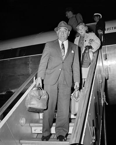 Richard Costain Australia, Man Disembarking Aeroplane, Essendon, Victoria, 22 Apr 1959