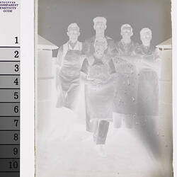 Five Men in Aprons on Roof, circa 1910s