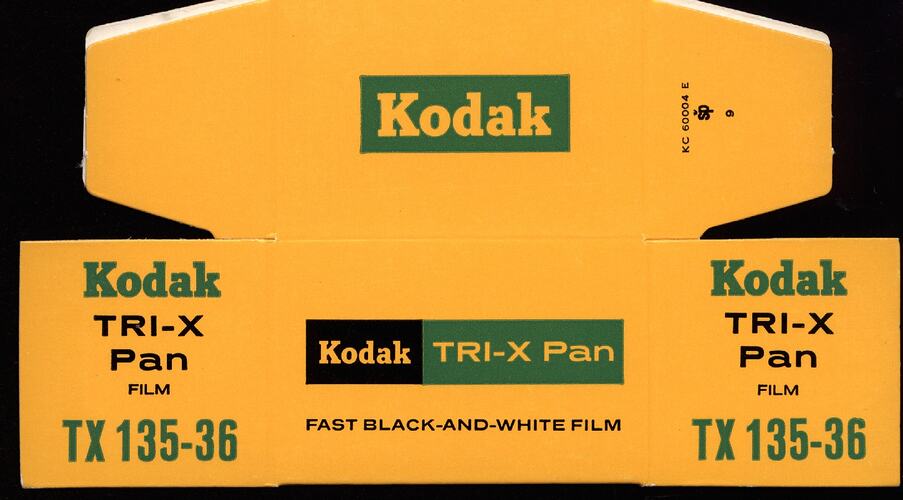 Yellow flatpack box with green and black text.