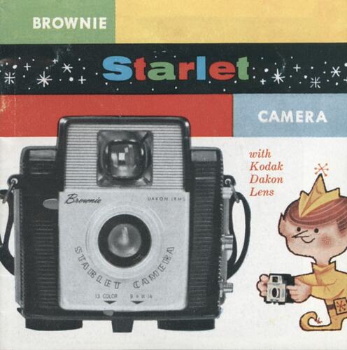 Cover page with photograph of camera plus cartoon.