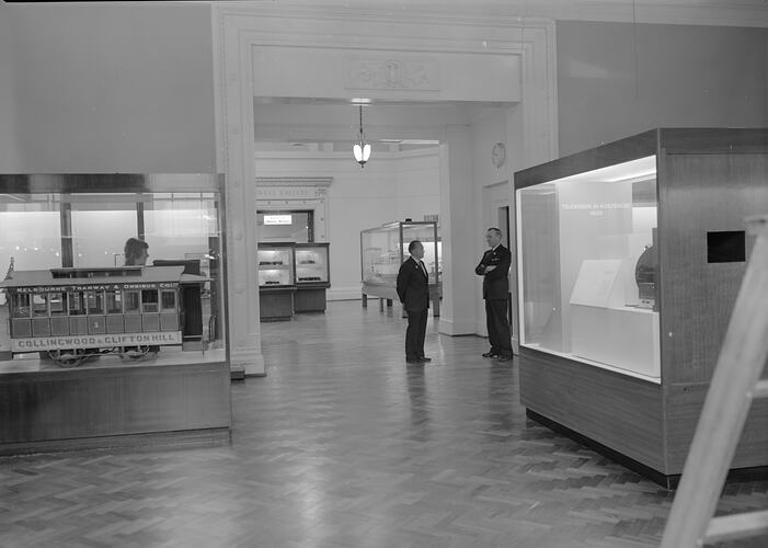 Two men viewing Bindon Hall displays, Science Museum, Melbourne, 1974