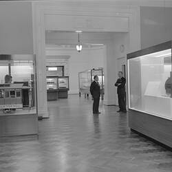 Two men viewing Bindon Hall displays, Science Museum, Melbourne, 1974