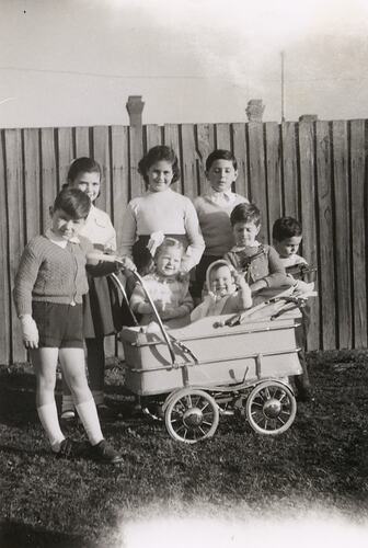 Children in suburban backyard.