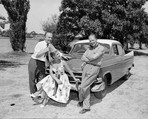 Cambridge Film & Television, Two Men & Woman with Chrysler Car, Albert Park, Victoria, Jan 1959