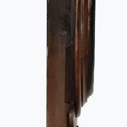 Profile of wooden wall clock with cedar drop dial case.