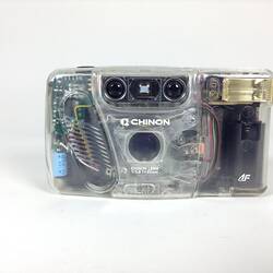 Camera with clear case showing internal parts.