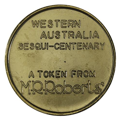 Round medal with raised text in centre.